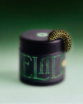 Caterpillar on a container labeled 'CELADON' with a green glow against a gradient background